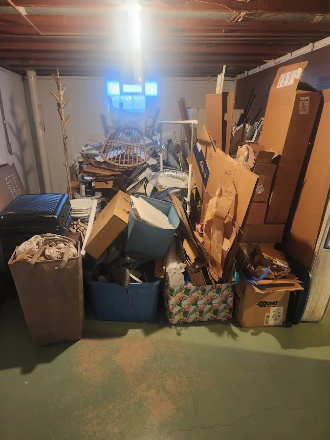 Roll-off dumpster container at job site for 6 Yard Dumpster Rental in Pompey